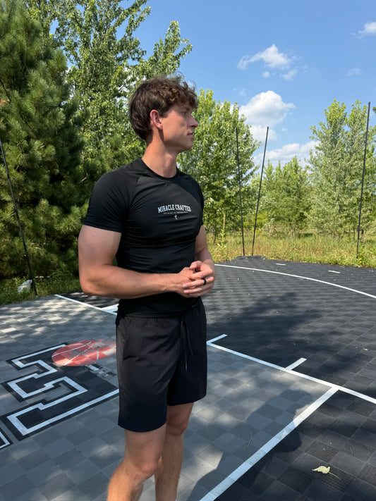 "REBUILT" Compression Tee — Black